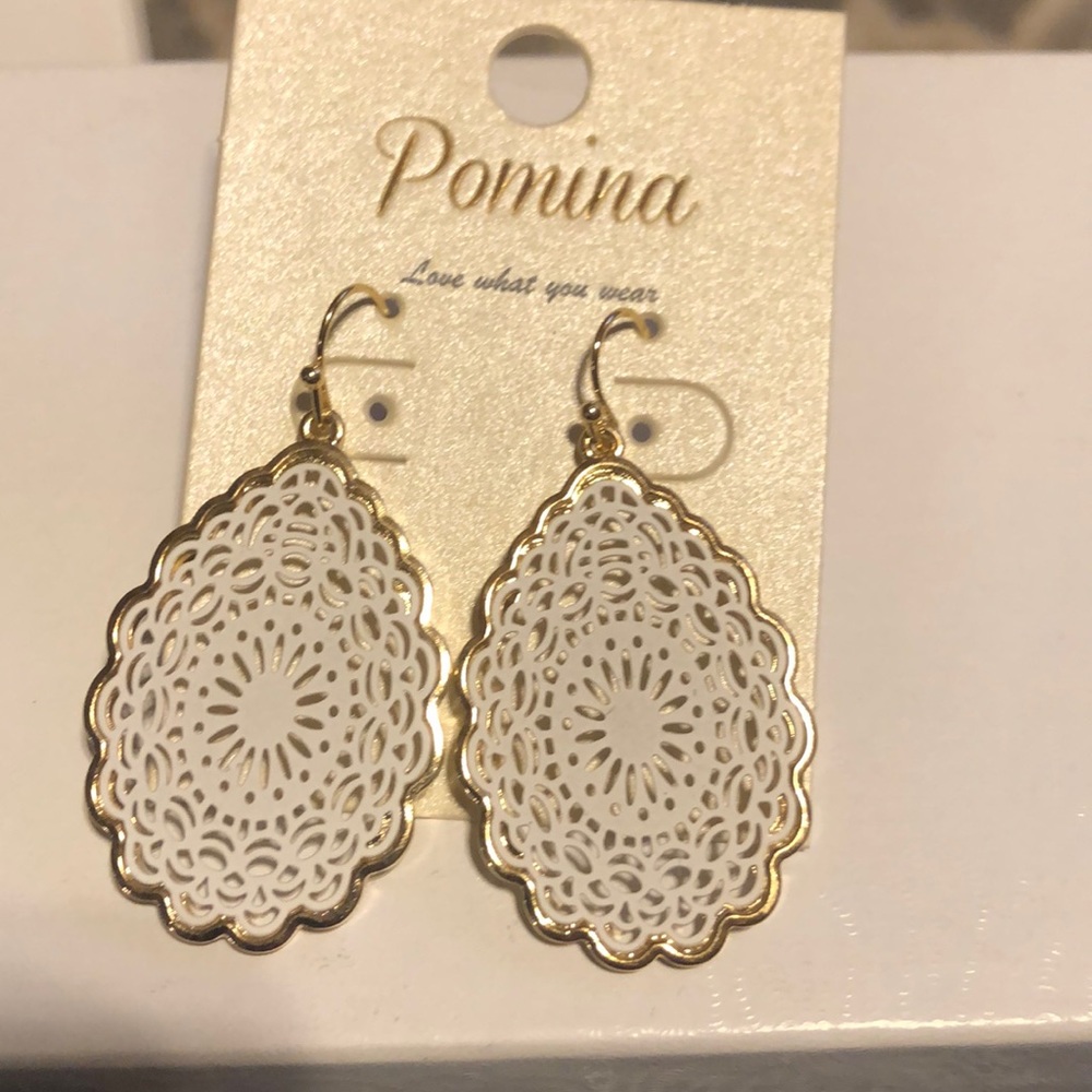 Gold and white earrings